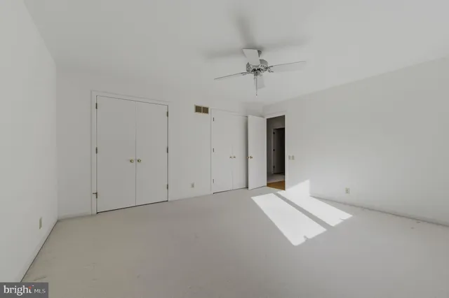 a view of a house with a tree