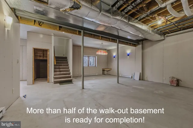 a view of an empty room with glass door