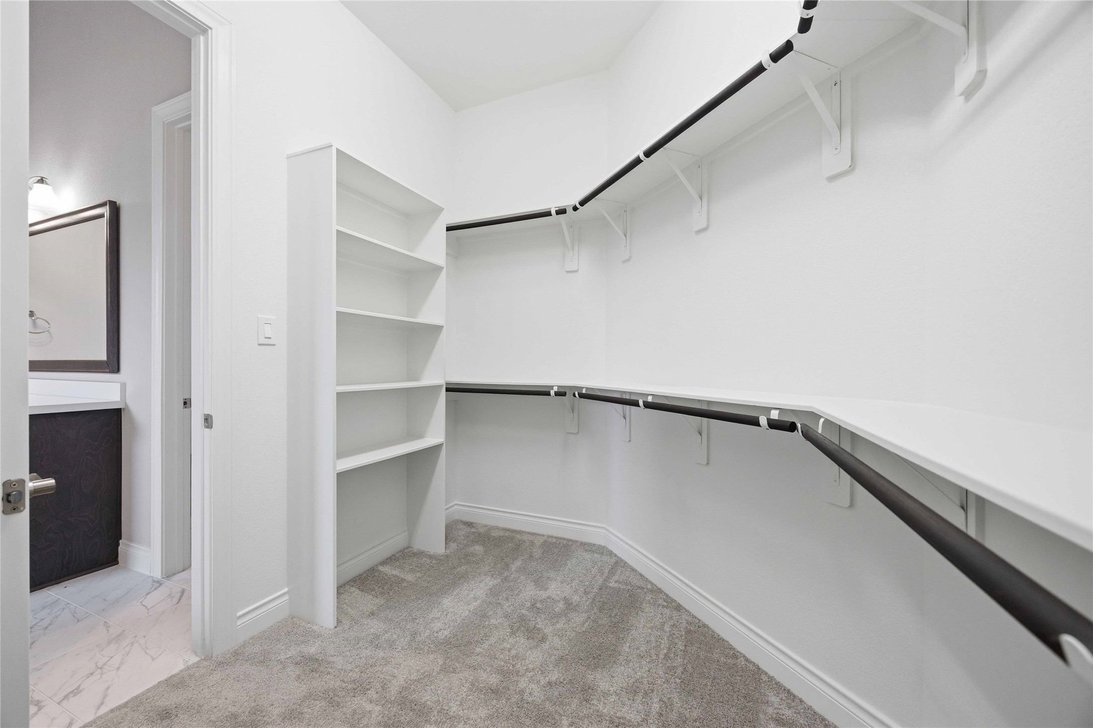 17564 Watercolor Way Conroe, TX 77302 - Photo 26 of 42 En Suite luxury primary bath has dual vanities, soaking sub, separate shower and two closets