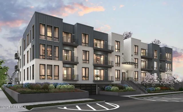 a city street lined with tall buildings