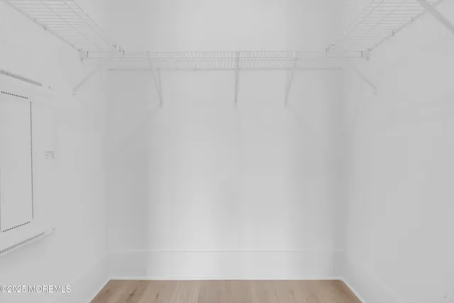 a bathroom with a toilet sink and shower