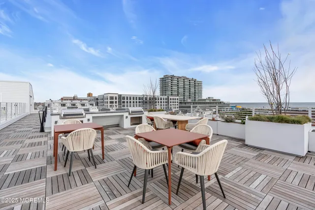 a view of a terrace with seating area