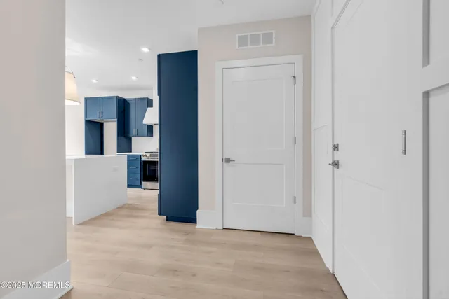 a kitchen with stainless steel appliances a sink stove and refrigerator