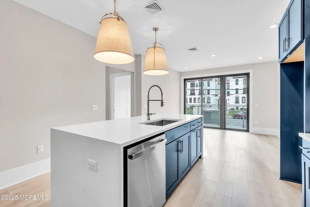 an empty room with large window