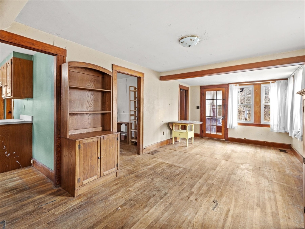 18 Cedar Street Westborough, MA 01581 - Photo 11 of 26 a view of a livingroom with furniture and an entryway