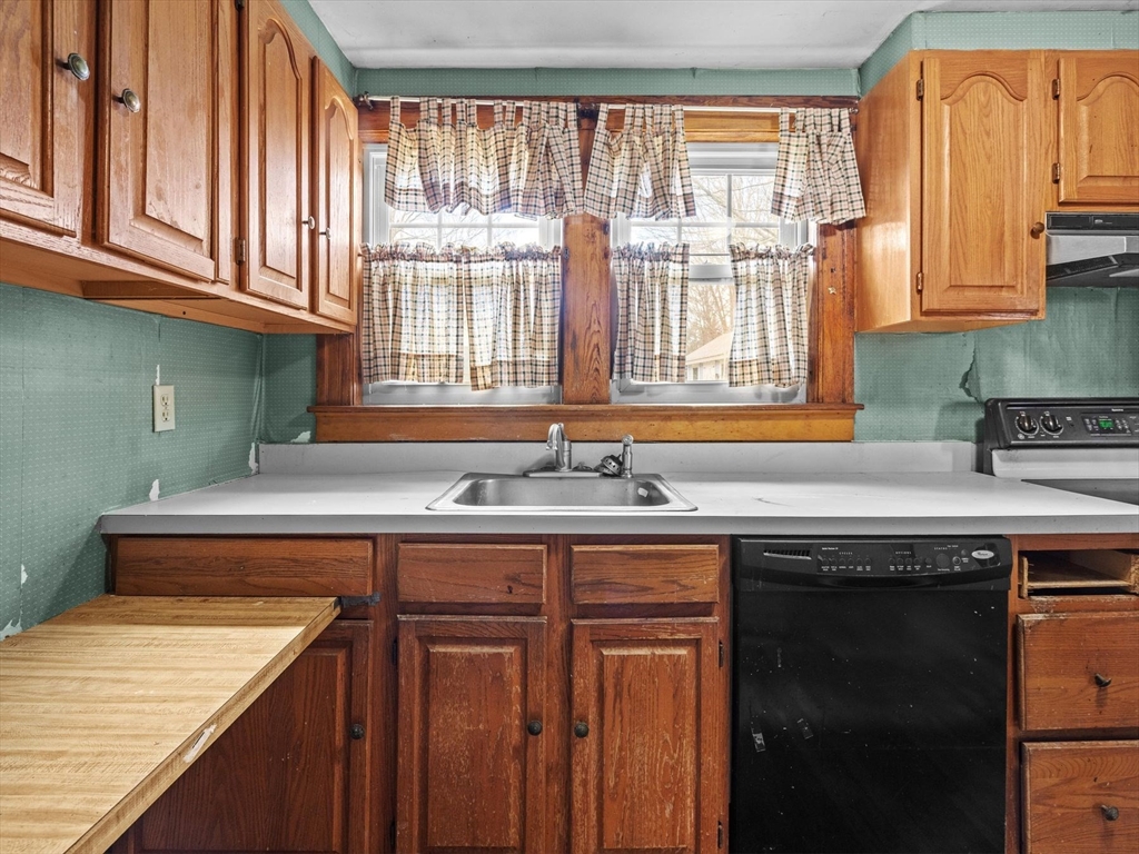18 Cedar Street Westborough, MA 01581 - Photo 15 of 26 a kitchen with stainless steel appliances granite countertop a sink and a cabinets