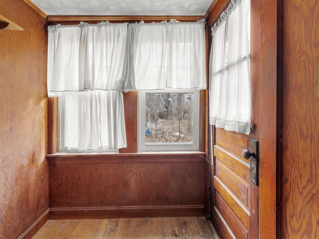 18 Cedar Street Westborough, MA 01581 - Photo 4 of 26 a view of a window in an empty room