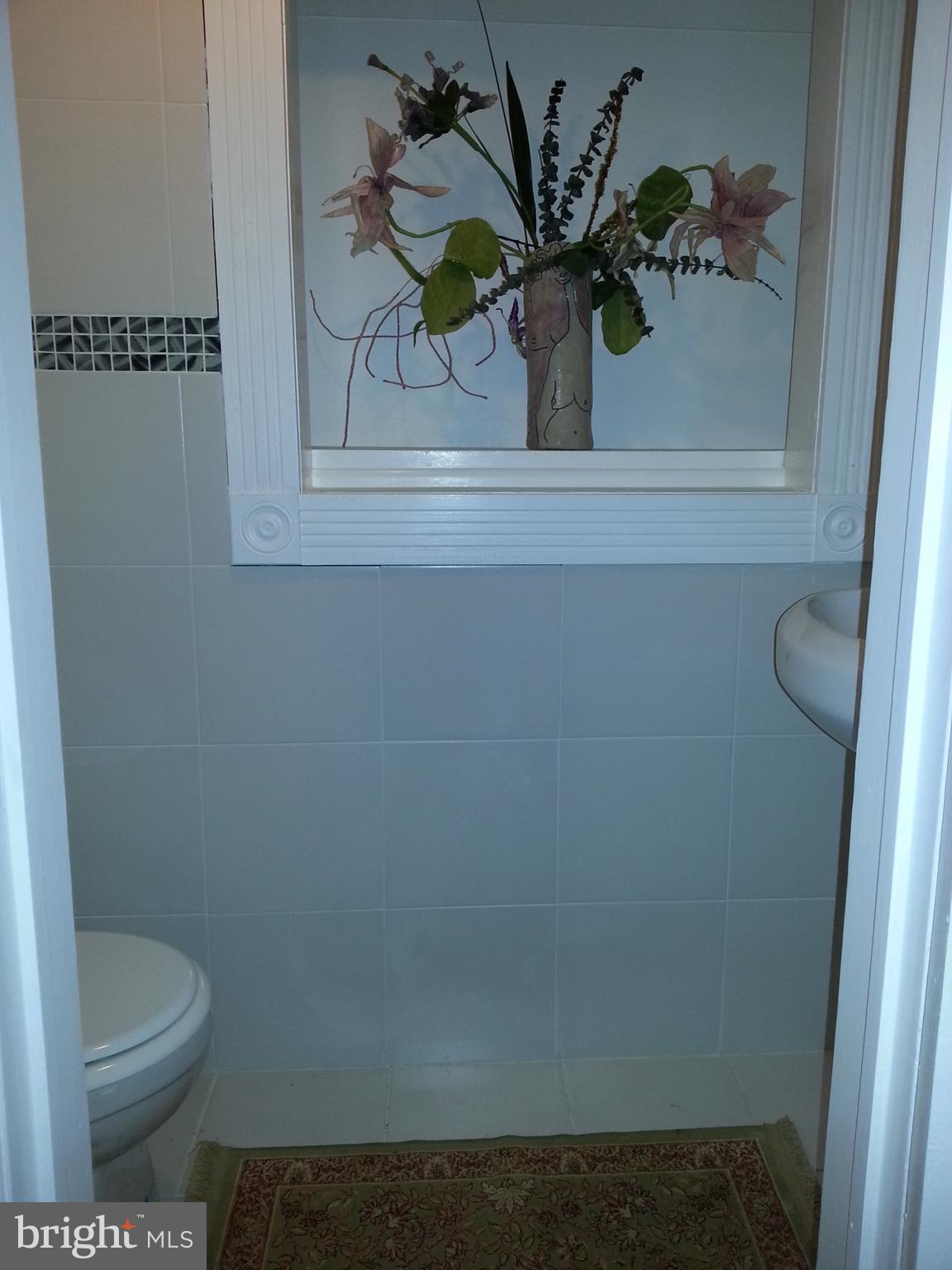 2063 Woodford Road Vienna, VA 22182 - Photo 22 of 26 half bathroom