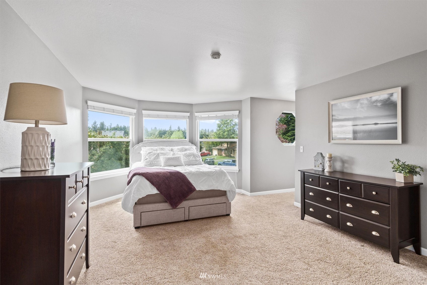 1208 228th Place Southwest Bothell, WA 98021 - Photo 16 of 33 a living room with furniture and a window
