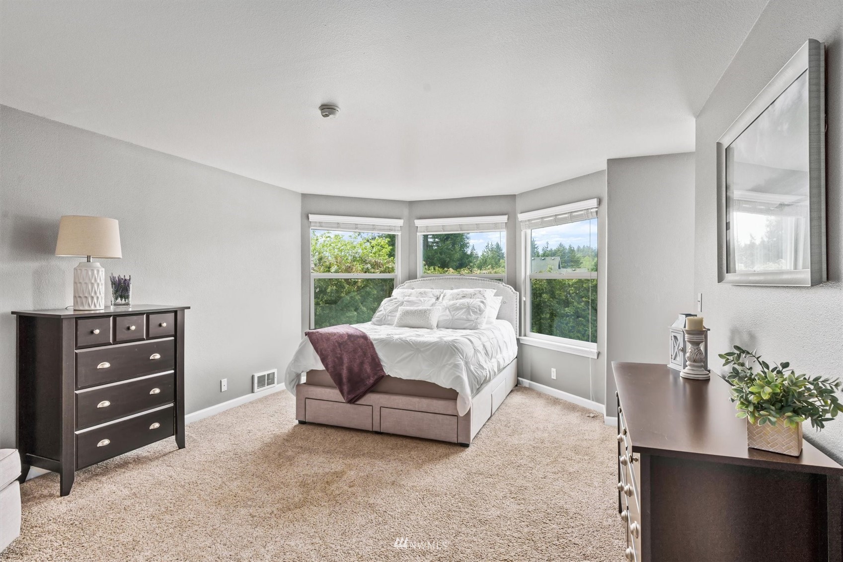 1208 228th Place Southwest Bothell, WA 98021 - Photo 17 of 33 a living room with furniture and a large window