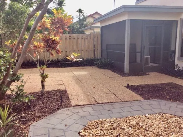 a view of a back yard of the house