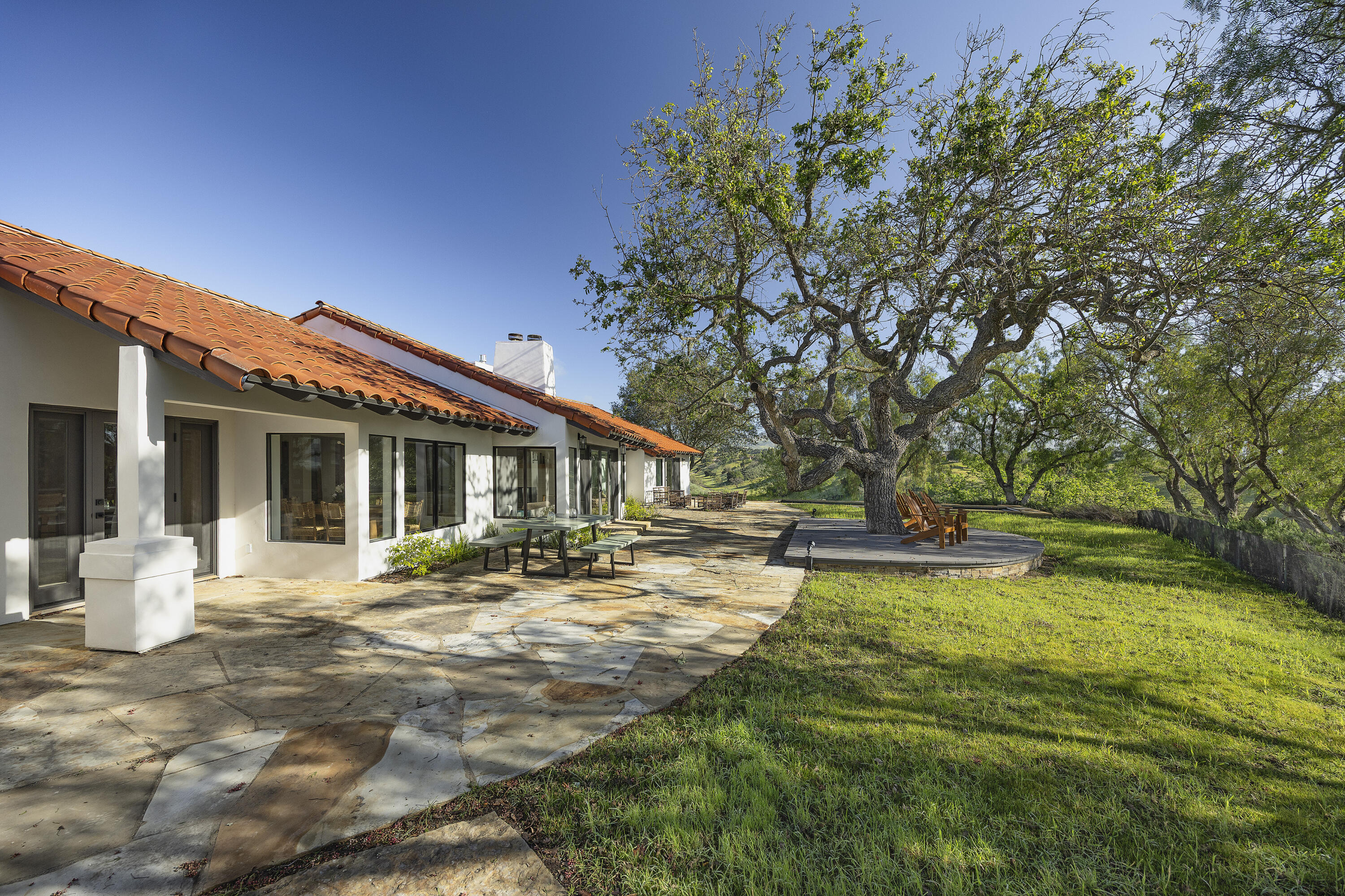 3009 Woodstock Road Santa Ynez, CA 93460 - Photo 2 of 32 a front view of a house with a yard