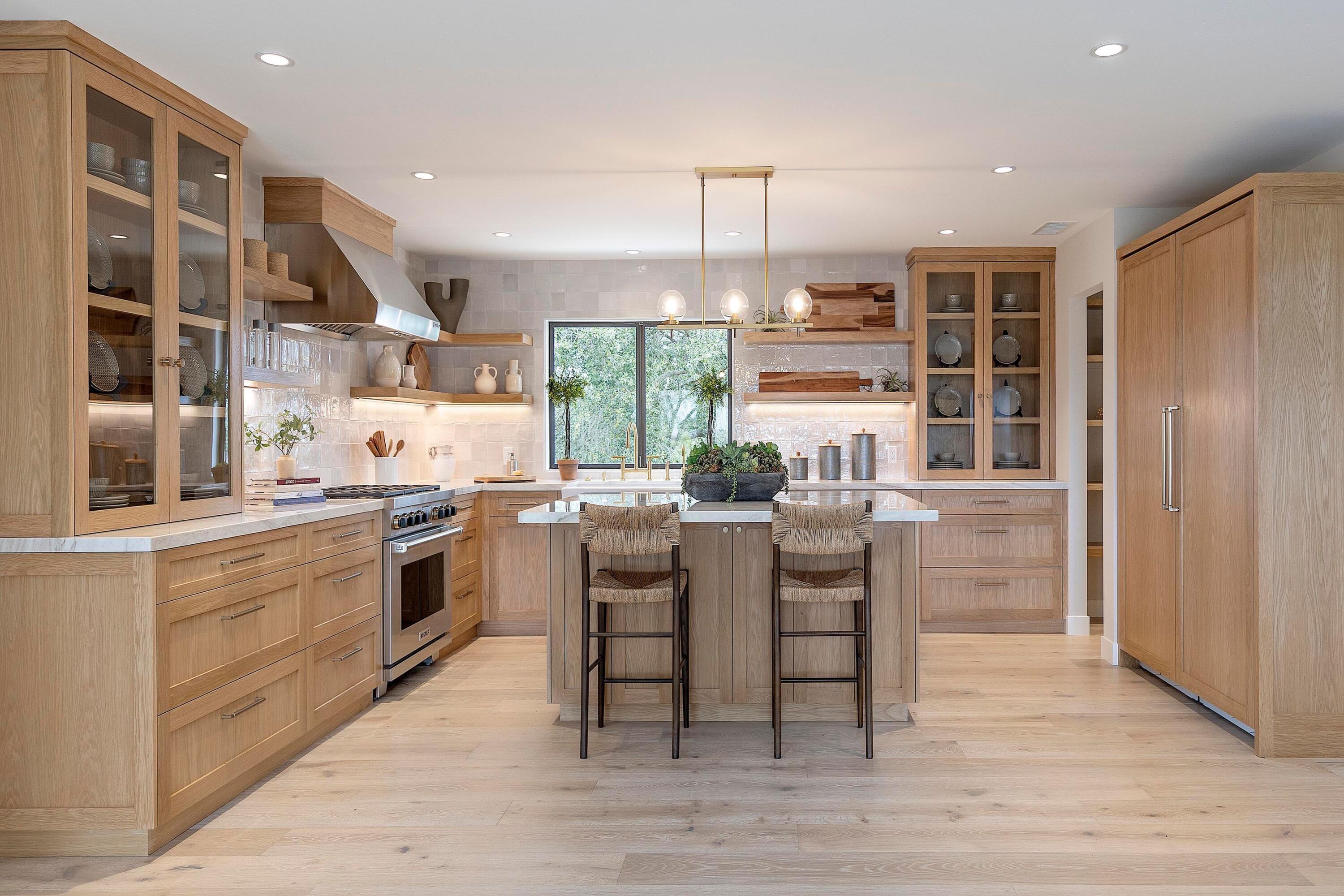 3009 Woodstock Road Santa Ynez, CA 93460 - Photo 22 of 32 a kitchen with kitchen island granite countertop a sink cabinets and stainless steel appliances