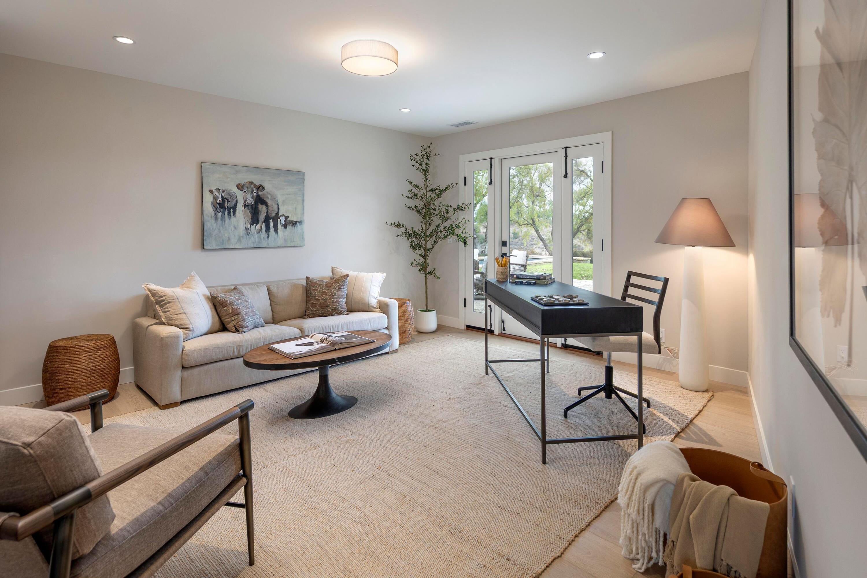 3009 Woodstock Road Santa Ynez, CA 93460 - Photo 24 of 32 a living room with furniture and a large window