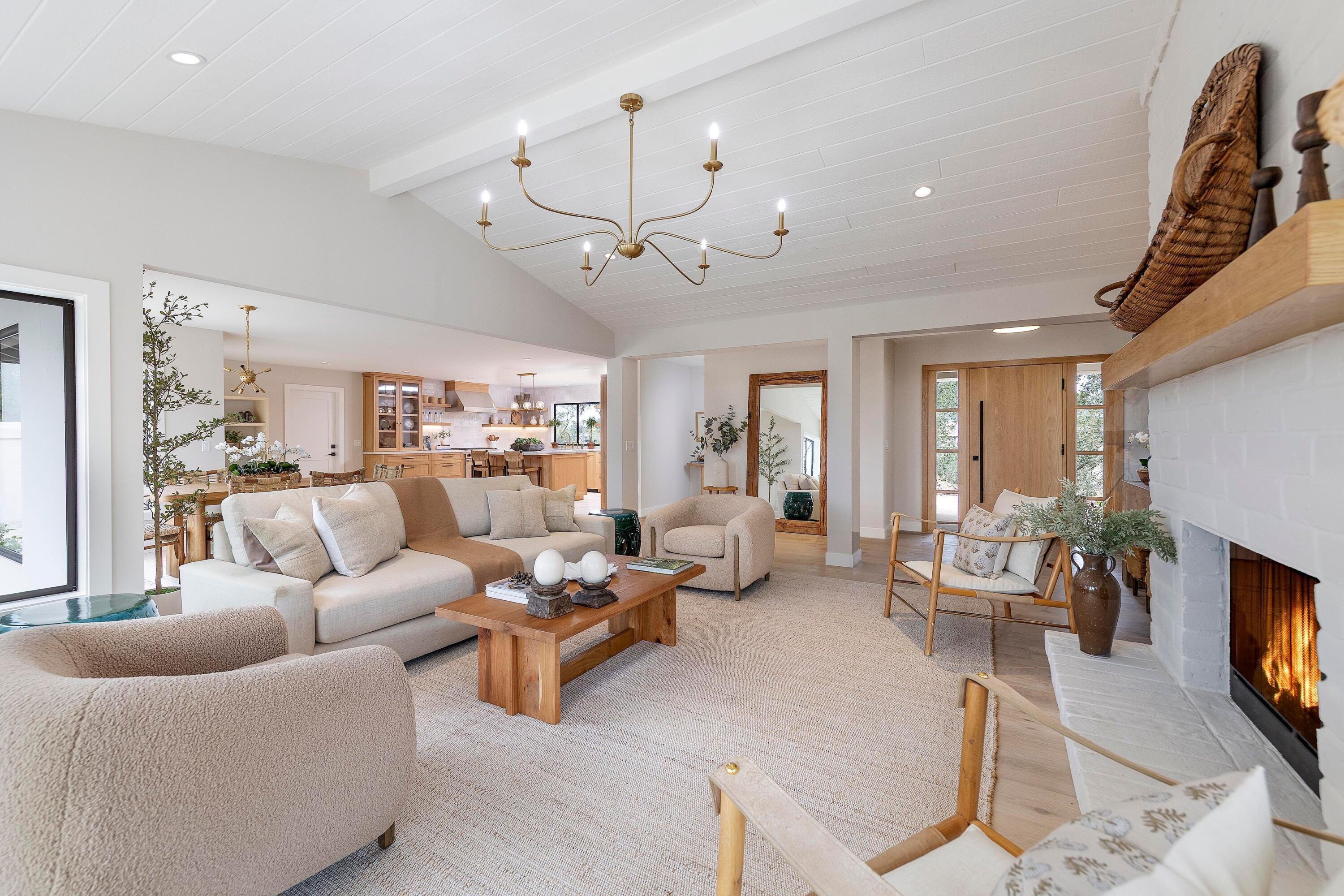 3009 Woodstock Road Santa Ynez, CA 93460 - Photo 26 of 32 a living room with furniture fireplace and a flat screen tv