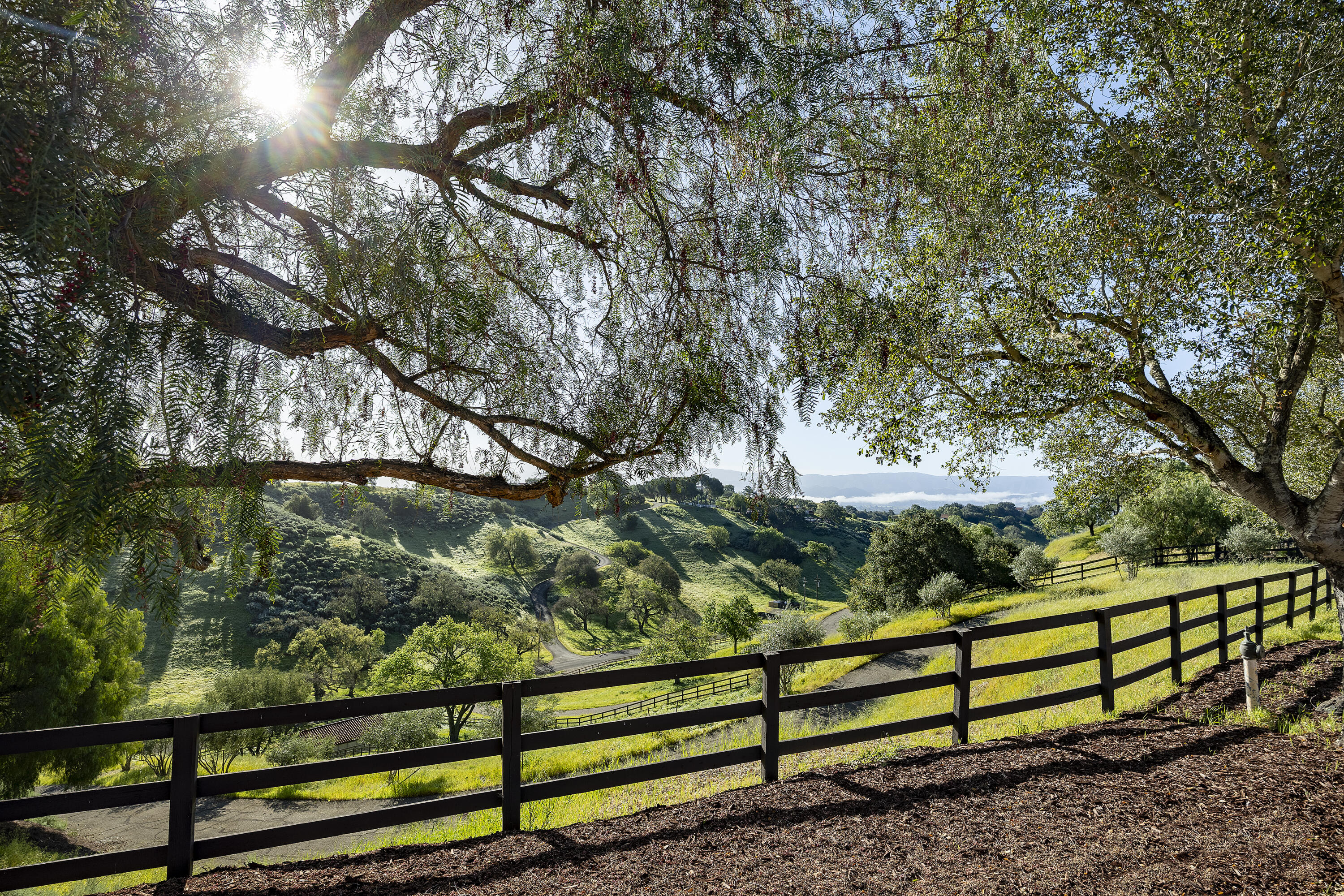 3009 Woodstock Road Santa Ynez, CA 93460 - Photo 9 of 32 a view of outdoor space with wooden deck and a bench