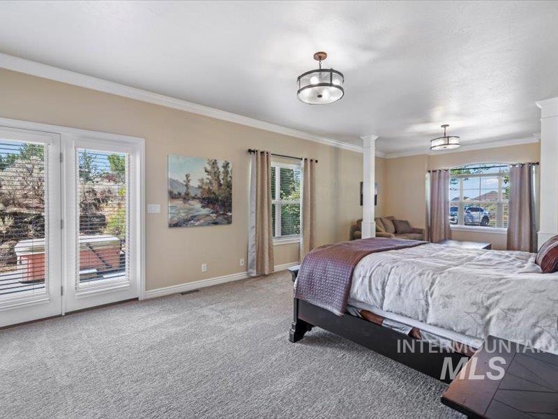 3408 Ridge Line Drive Kimberly, ID 83341 - Photo 24 of 37 Carpeted bedroom featuring access to exterior and ornamental molding