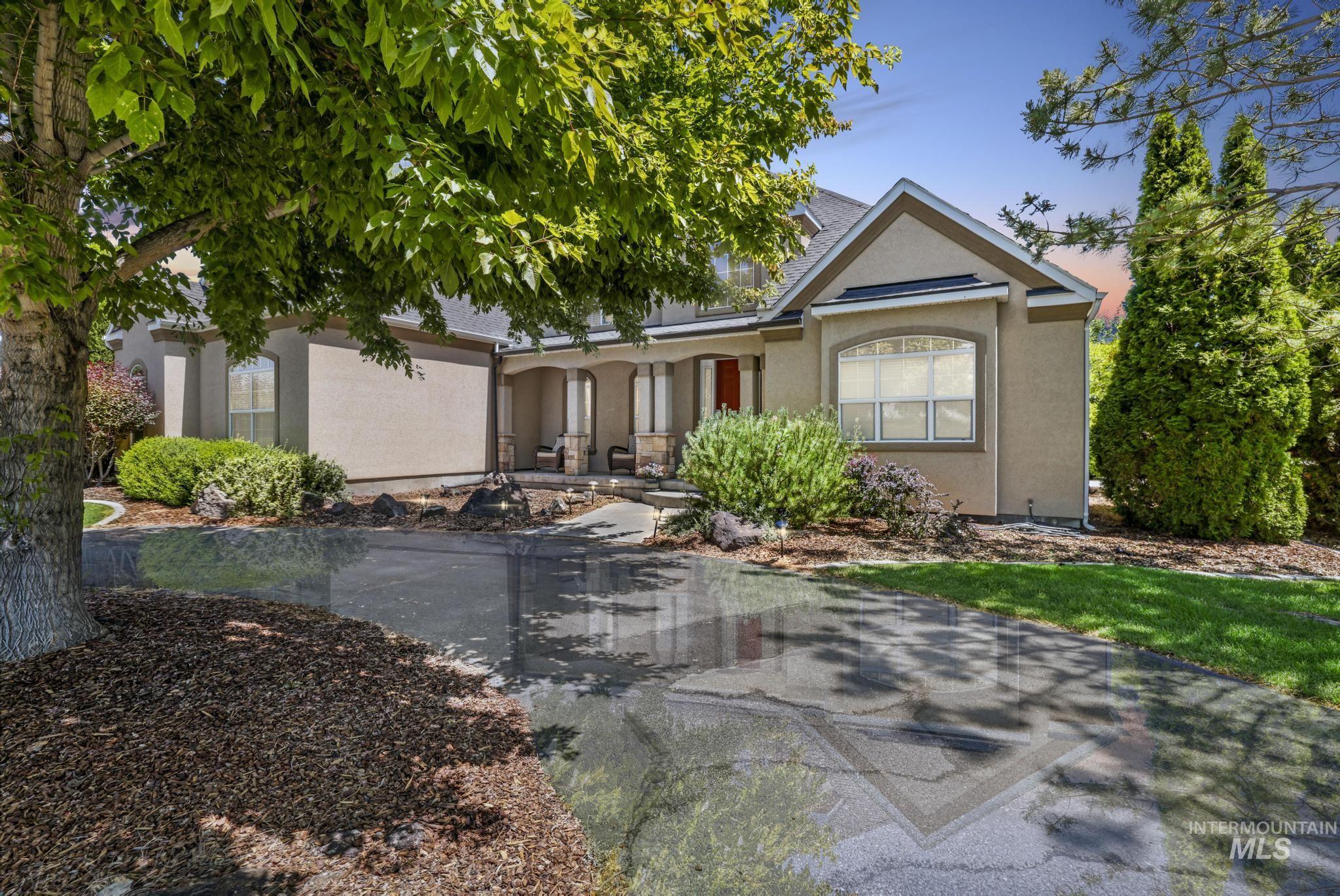 3408 Ridge Line Drive Kimberly, ID 83341 - Photo 3 of 37 Ranch-style house with stucco siding and a porch