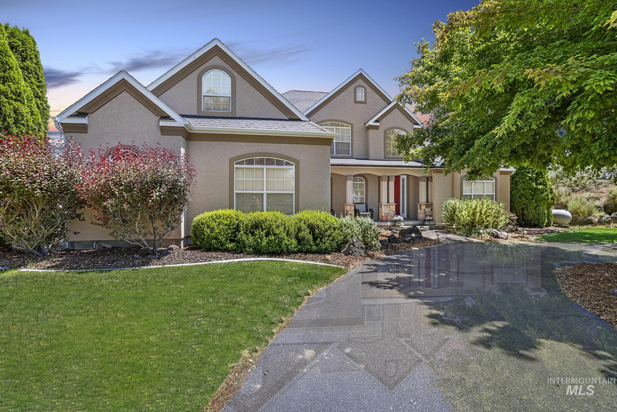 3408 Ridge Line Drive Kimberly, ID 83341 - Photo 4 of 37 Traditional home featuring covered porch, stucco siding, and a front yard