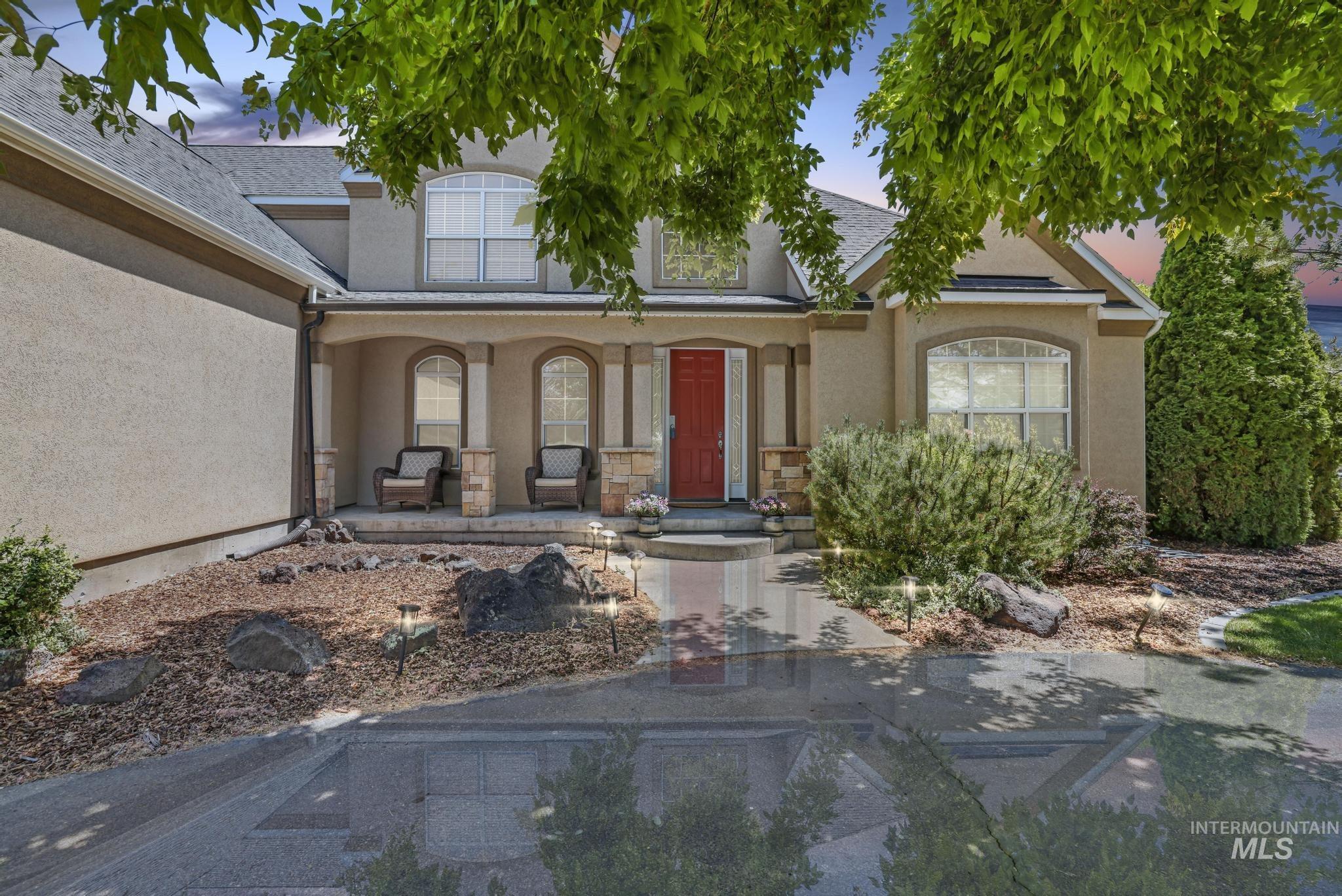 3408 Ridge Line Drive Kimberly, ID 83341 - Photo 6 of 37 Doorway to property with covered porch and stucco siding