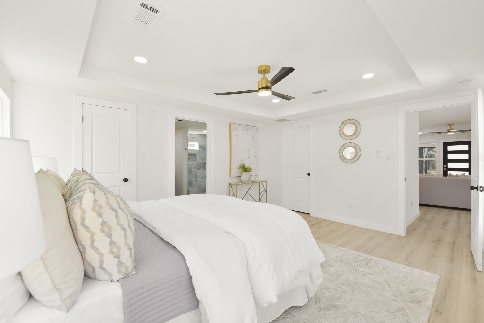 1630 1/2 Tabor Street Houston, TX 77009 - Photo 16 of 28 a bedroom with a bed and a chandelier