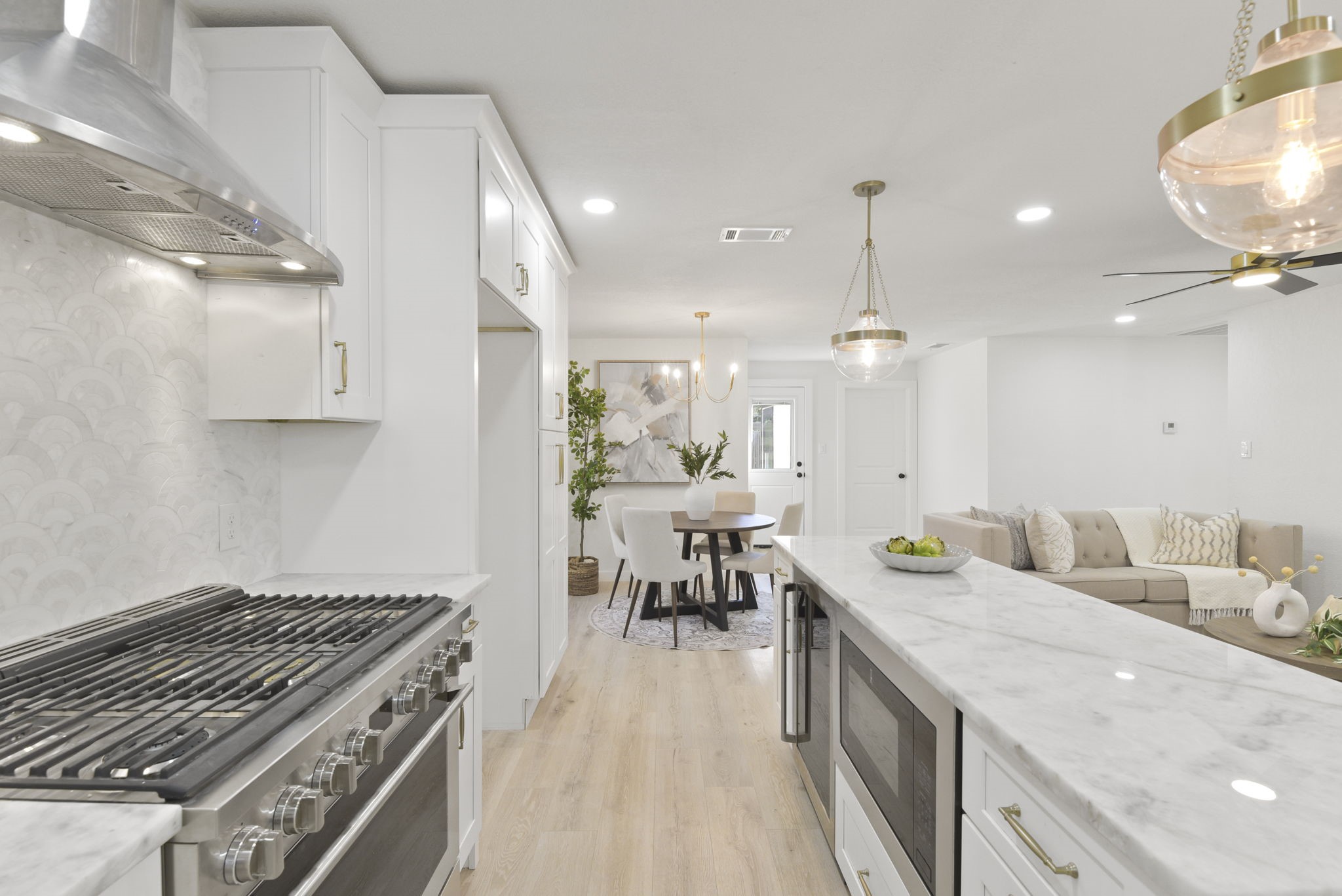 1630 1/2 Tabor Street Houston, TX 77009 - Photo 7 of 28 a kitchen with sink stove and cabinets