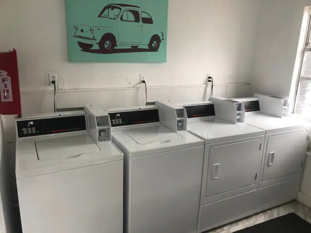 5909 Bolm Road, Unit 12 Austin, TX 78721 - Photo 12 of 15 a utility room with dryer and washer