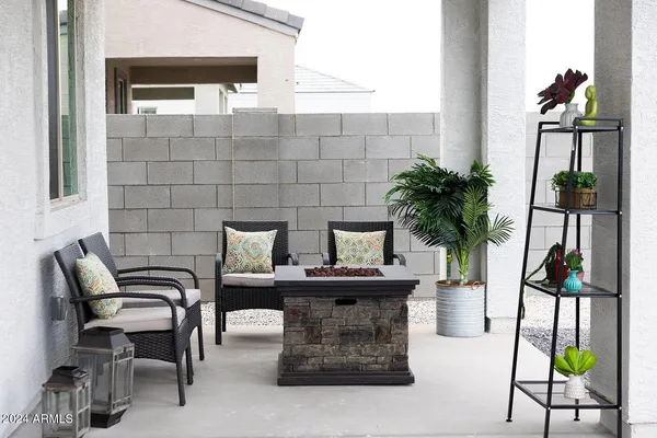 a view of a lobby with furniture and garden