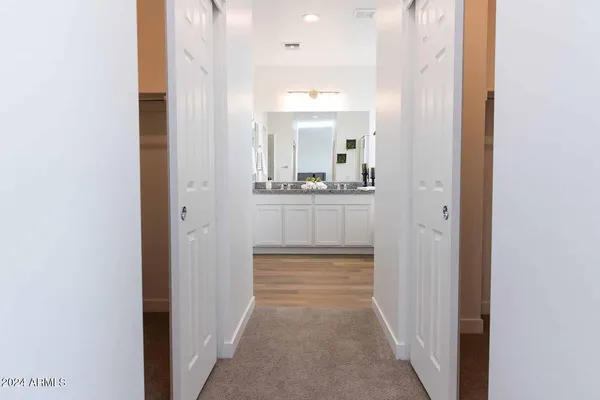 a bathroom with a sink and mirror