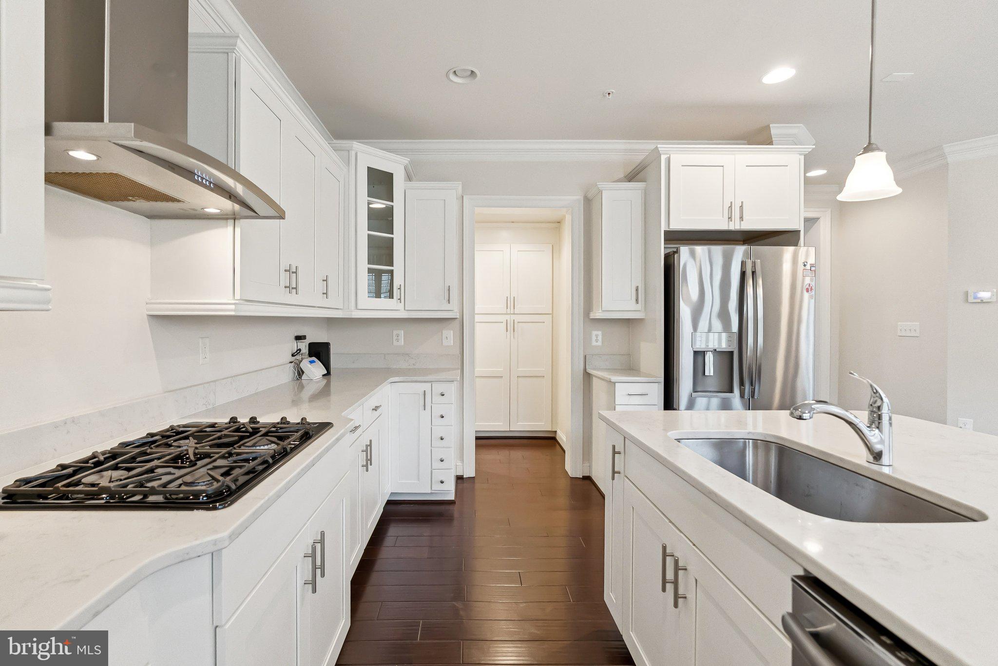 608 Fair Winds Way, Unit 262A Oxon Hill, MD 20745 - Photo 14 of 48 a kitchen with a sink stove and refrigerator