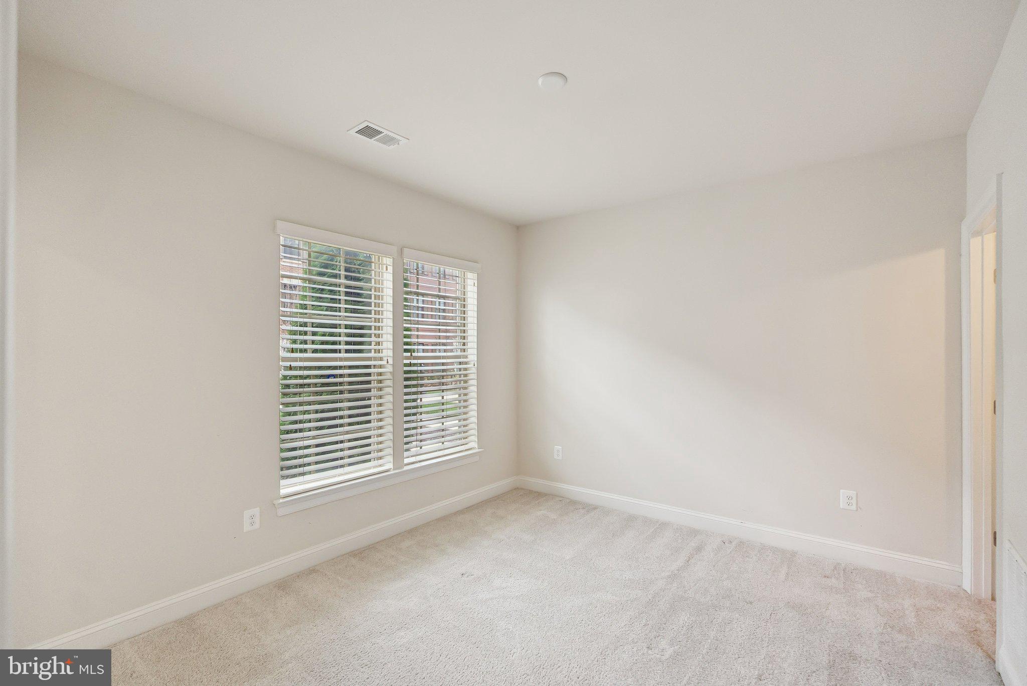 608 Fair Winds Way, Unit 262A Oxon Hill, MD 20745 - Photo 19 of 48 a view of empty room with a window