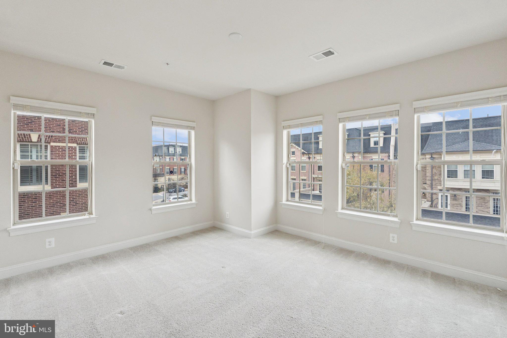 608 Fair Winds Way, Unit 262A Oxon Hill, MD 20745 - Photo 23 of 48 an empty room with windows