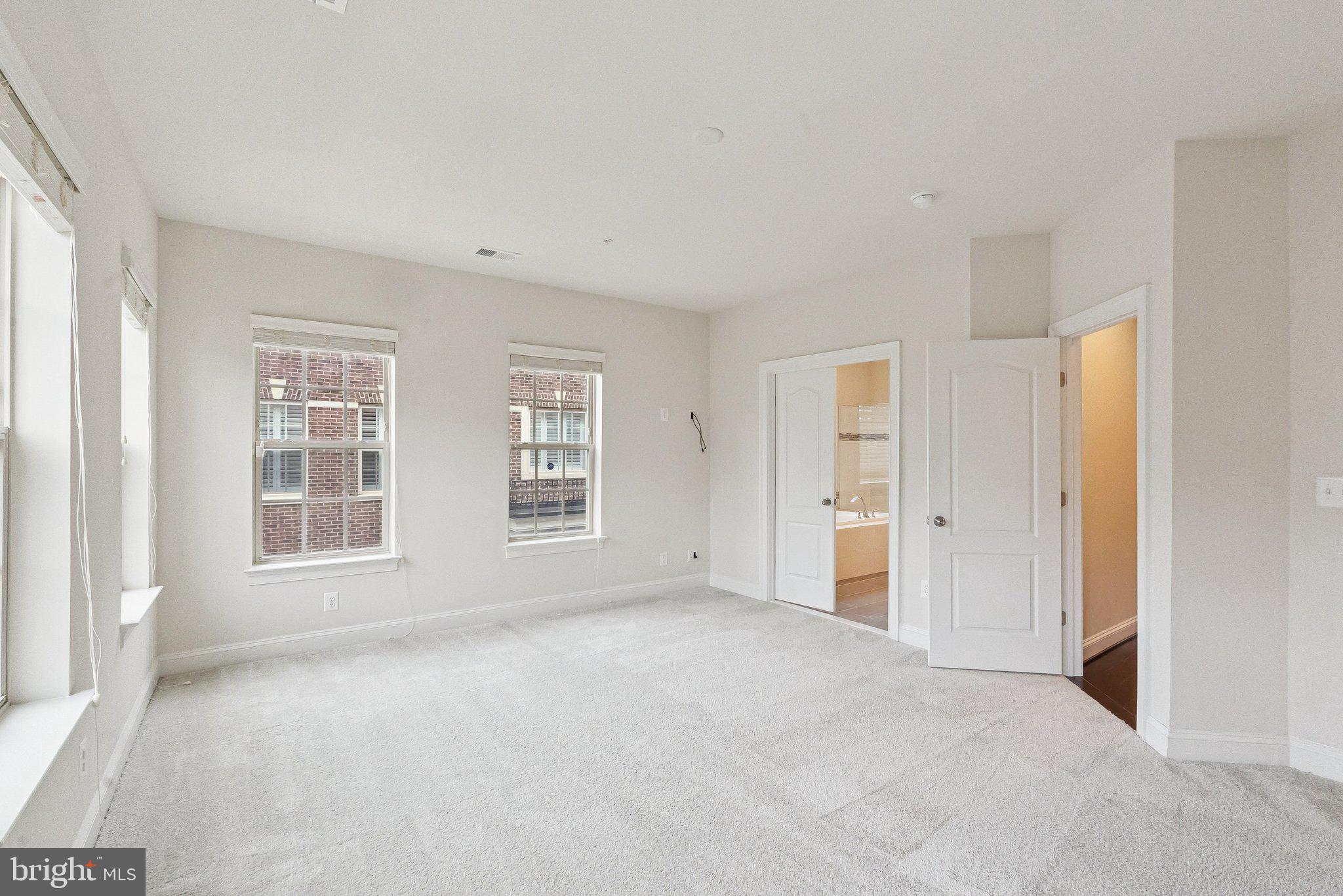 608 Fair Winds Way, Unit 262A Oxon Hill, MD 20745 - Photo 27 of 48 a view of an empty room with a window