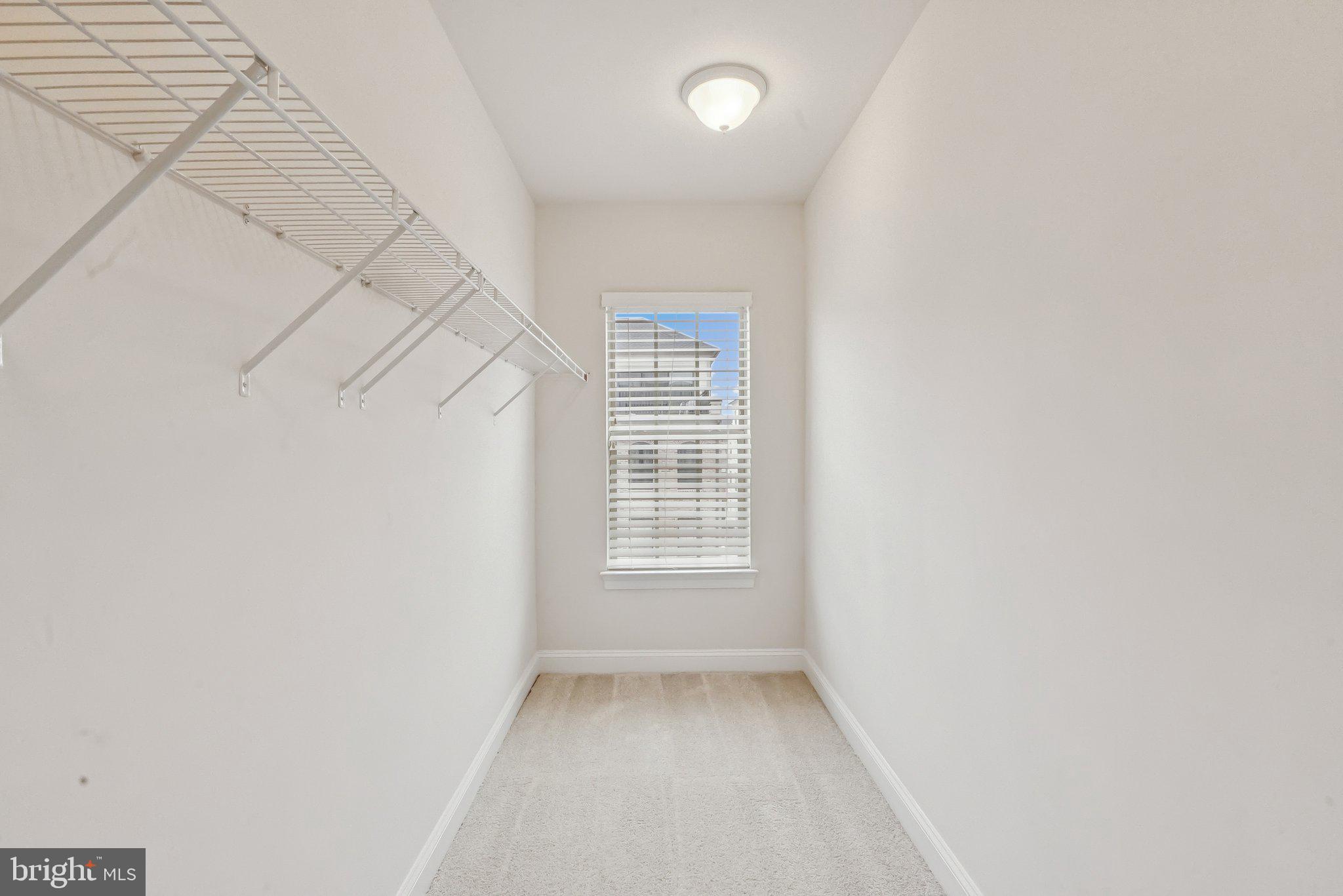 608 Fair Winds Way, Unit 262A Oxon Hill, MD 20745 - Photo 28 of 48 a view of an empty room with a window