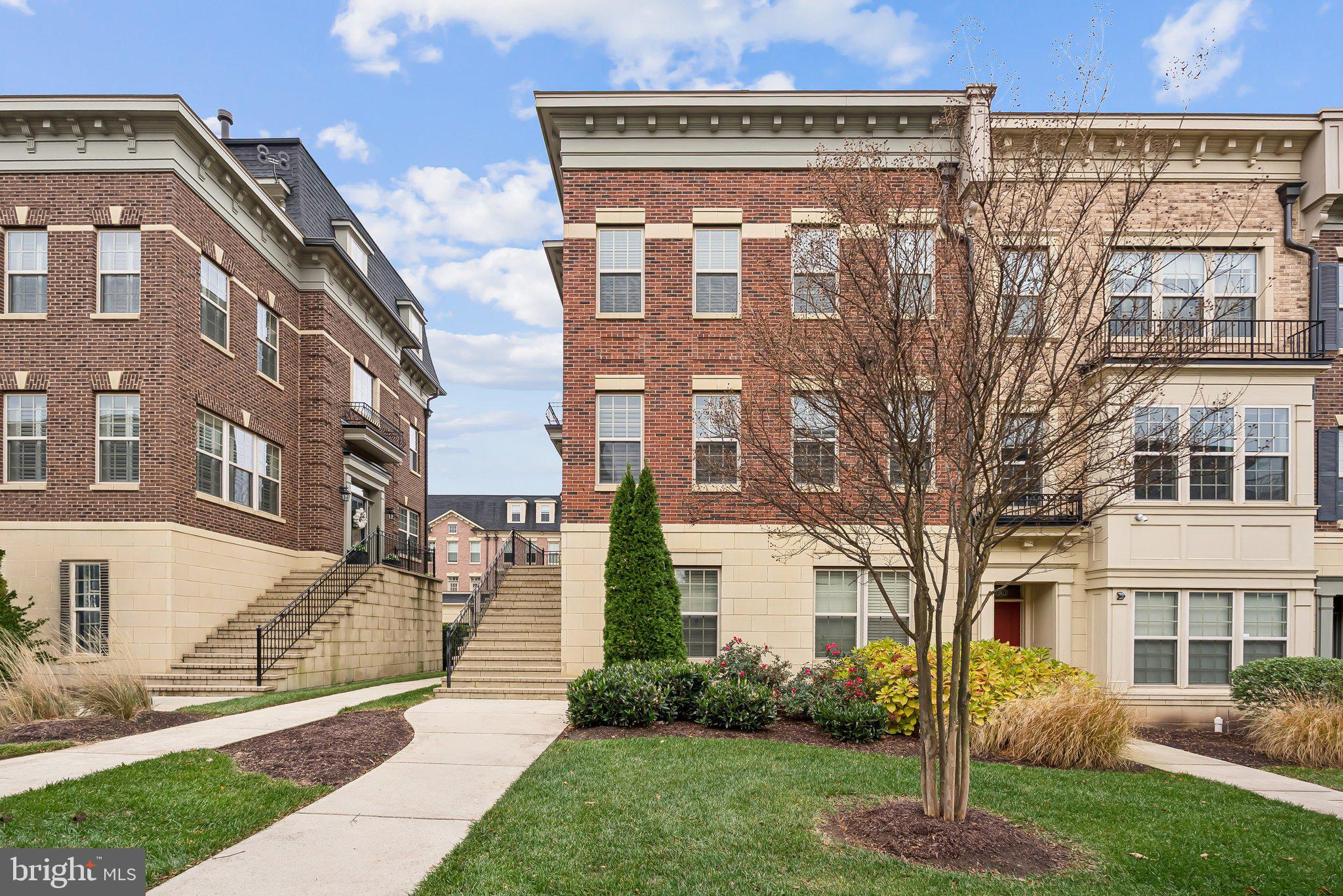 608 Fair Winds Way, Unit 262A Oxon Hill, MD 20745 - Photo 43 of 48 a front view of a house with garden