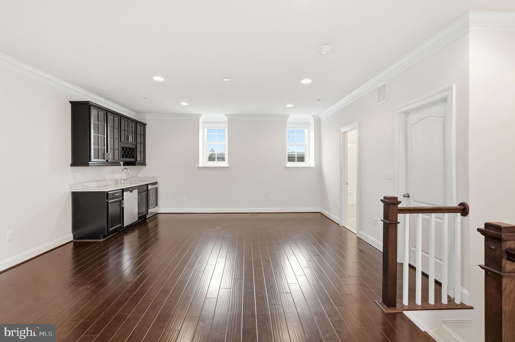 608 Fair Winds Way, Unit 262A Oxon Hill, MD 20745 - Photo 5 of 48 wooden floor in an empty room with a window