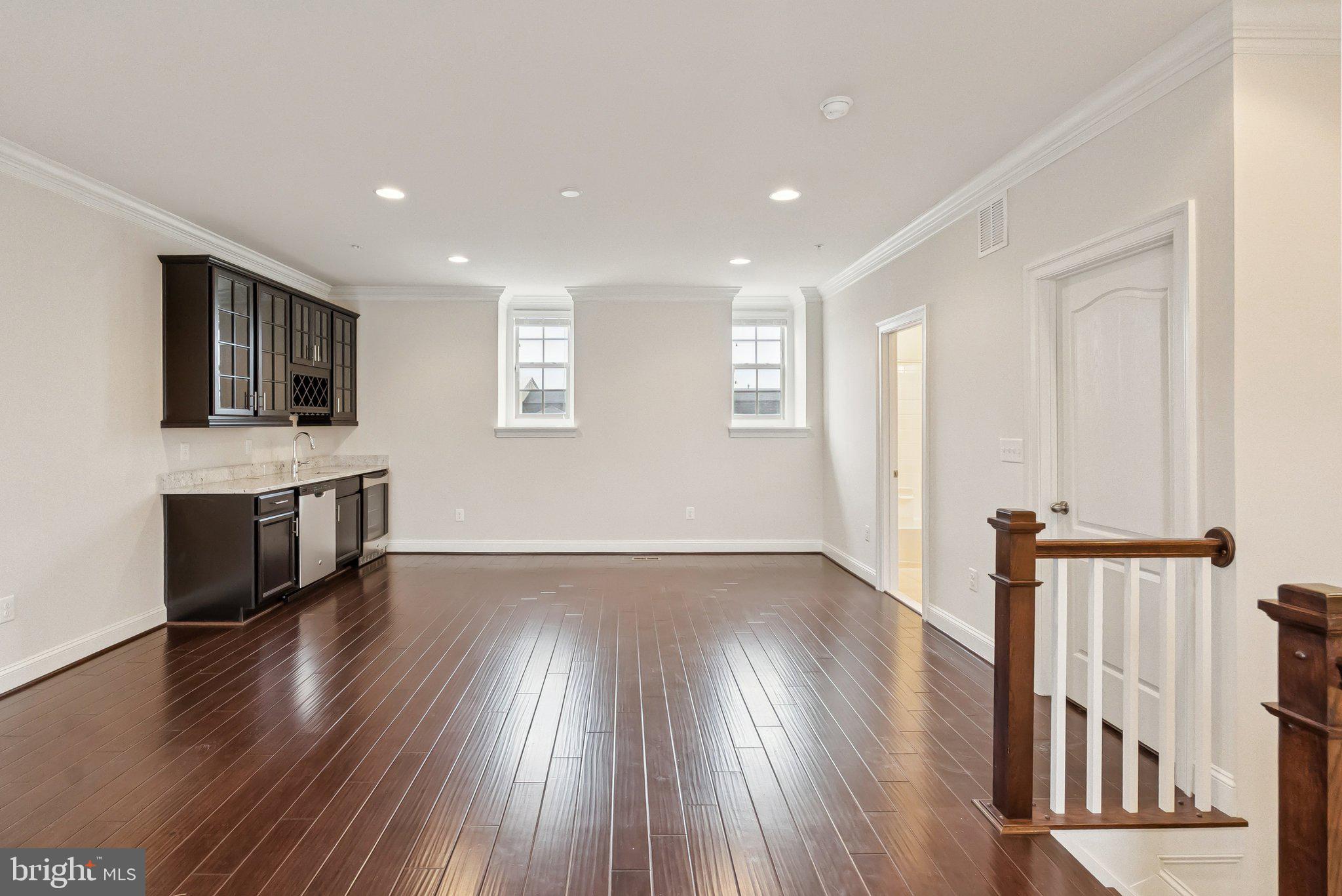 608 Fair Winds Way, Unit 262A Oxon Hill, MD 20745 - Photo 6 of 48 wooden floor in an empty room with a window