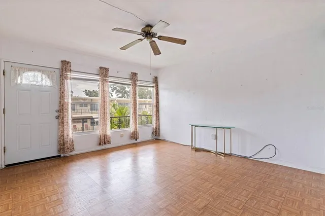 a kitchen with cabinets and stainless steel appliances
