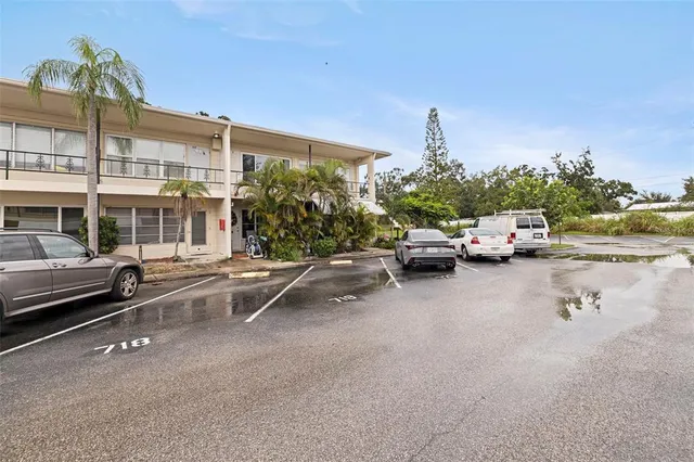 a view of a street with cars