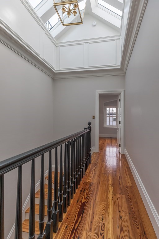 793 East 4th Street Boston, MA 02127 - Photo 11 of 17 a view of hallway with wooden floor
