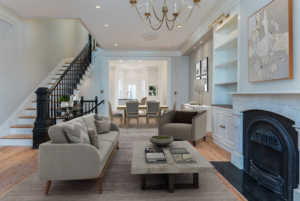 793 East 4th Street Boston, MA 02127 - Photo 12 of 17 a living room with furniture a fireplace and white walls