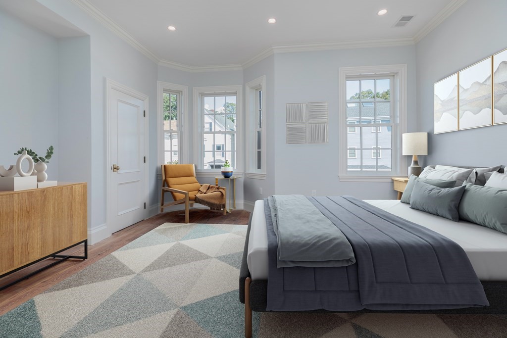 793 East 4th Street Boston, MA 02127 - Photo 14 of 17 a bedroom with a bed and window