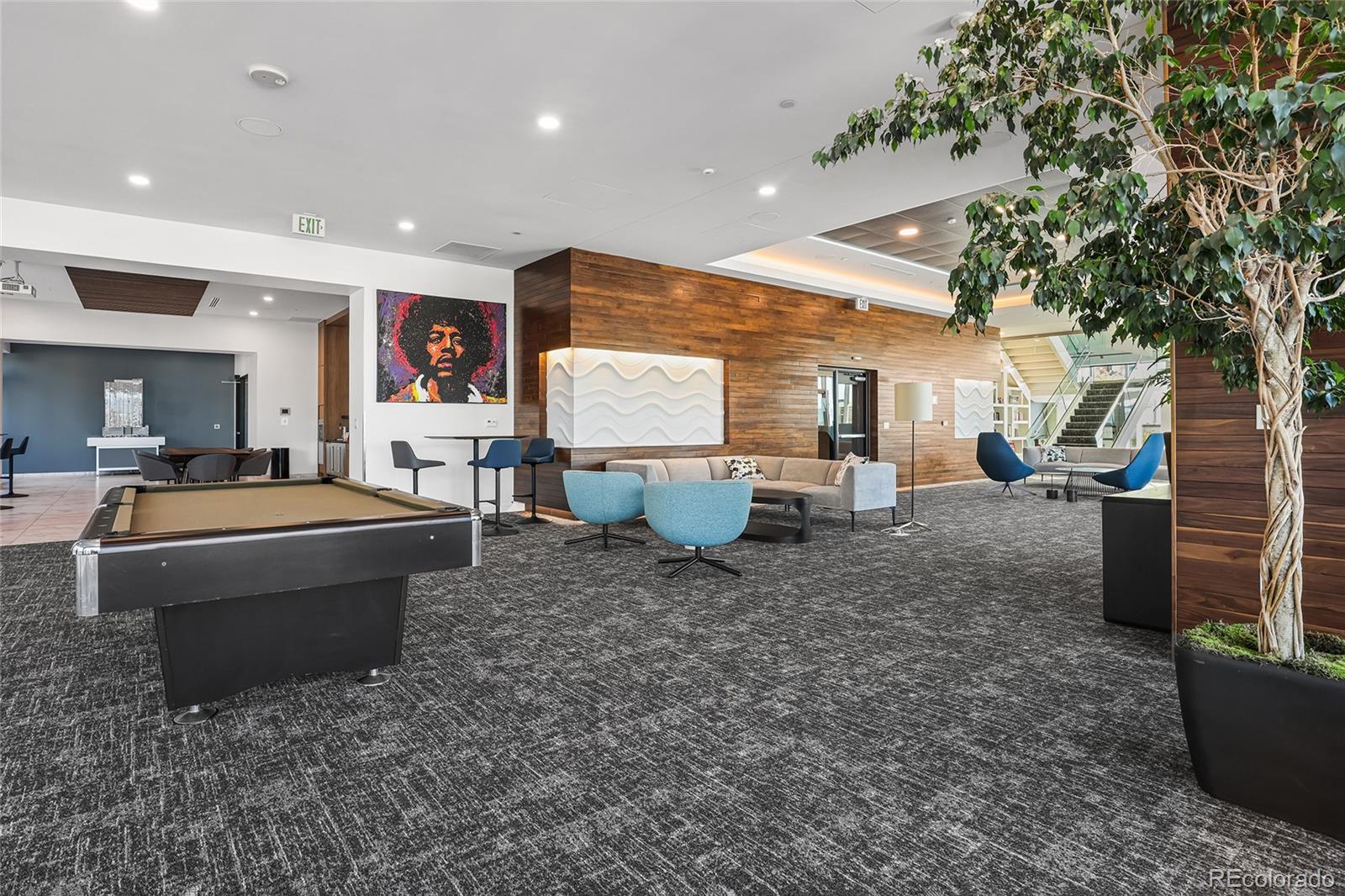 891 14th Street, Unit 1111L Denver, CO 80202 - Photo 23 of 39 a living room with furniture and a potted plant