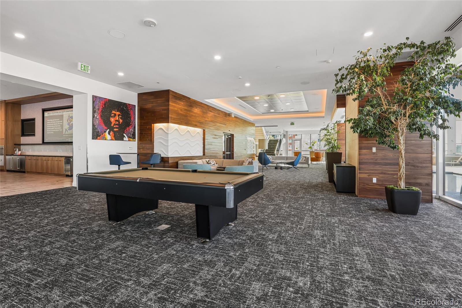 891 14th Street, Unit 1111L Denver, CO 80202 - Photo 24 of 39 a living room with furniture and a potted plant