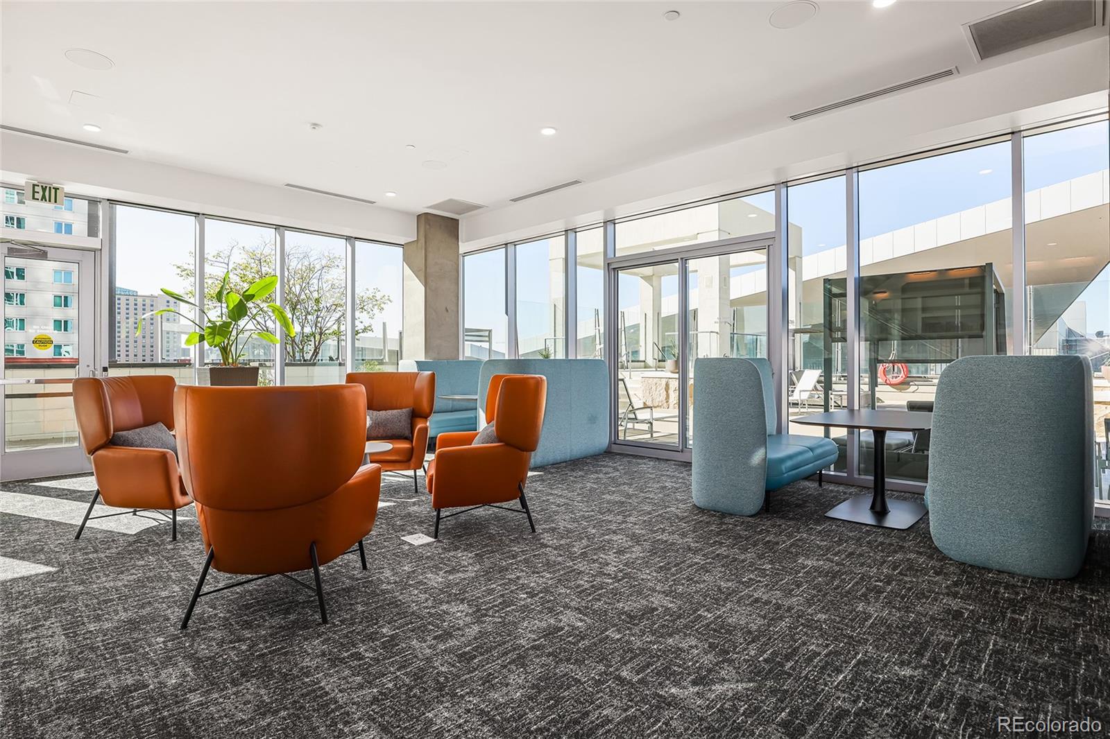891 14th Street, Unit 1111L Denver, CO 80202 - Photo 26 of 39 a living room with furniture and a potted plant