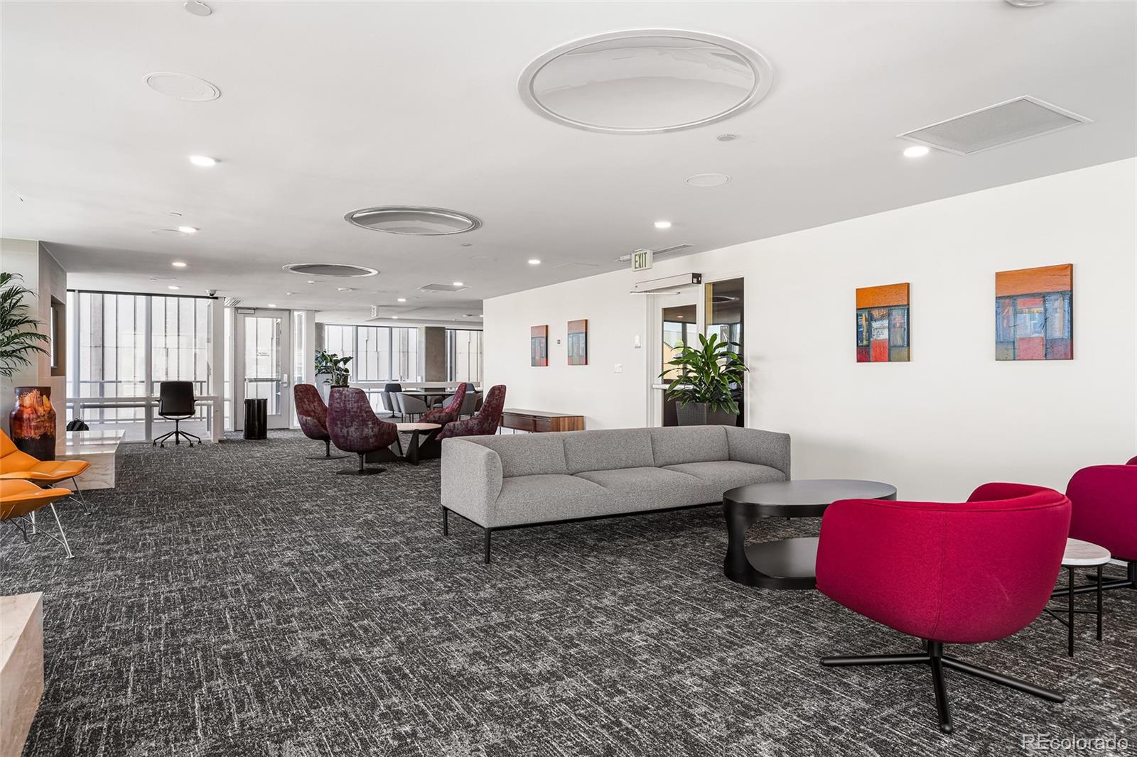 891 14th Street, Unit 1111L Denver, CO 80202 - Photo 28 of 39 a living room with furniture and a wooden floor