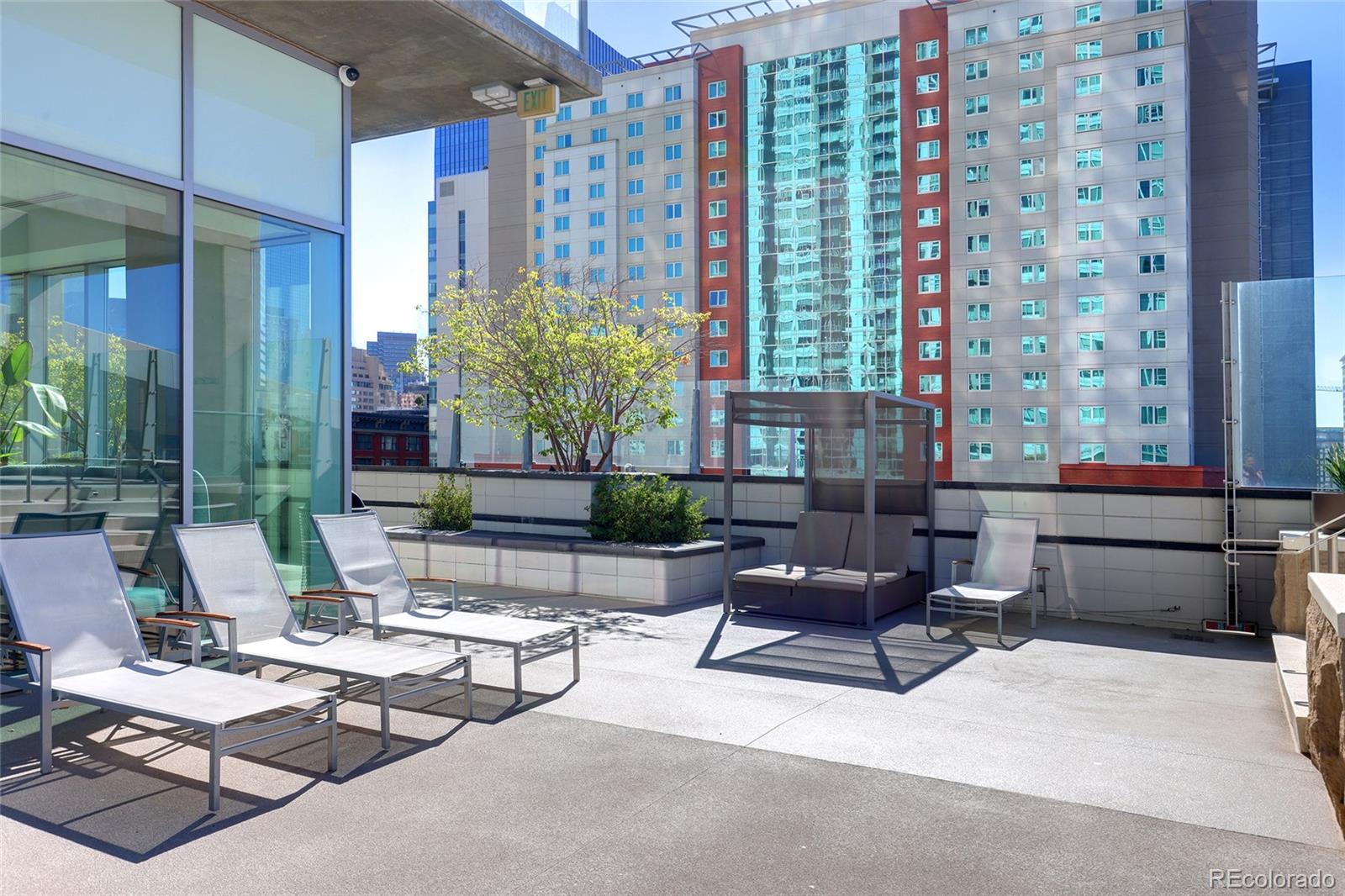 891 14th Street, Unit 1111L Denver, CO 80202 - Photo 35 of 39 a living room with furniture and a large window