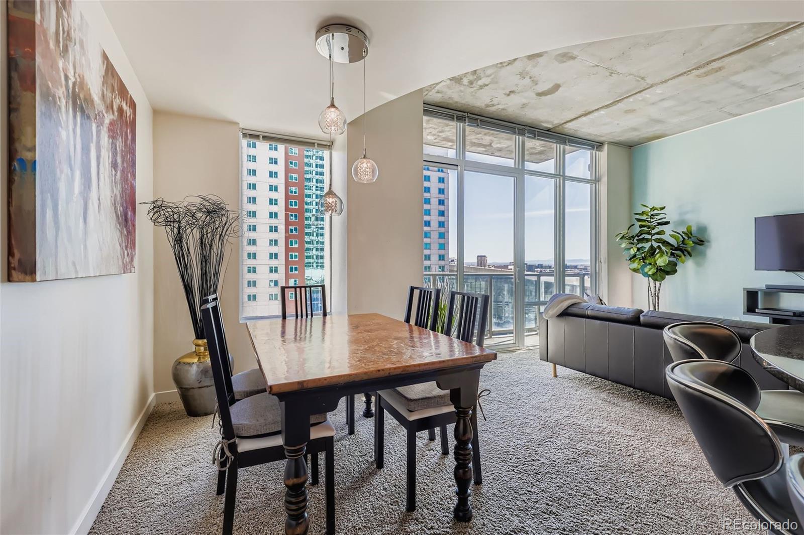 891 14th Street, Unit 1111L Denver, CO 80202 - Photo 6 of 39 a dining room with furniture and window