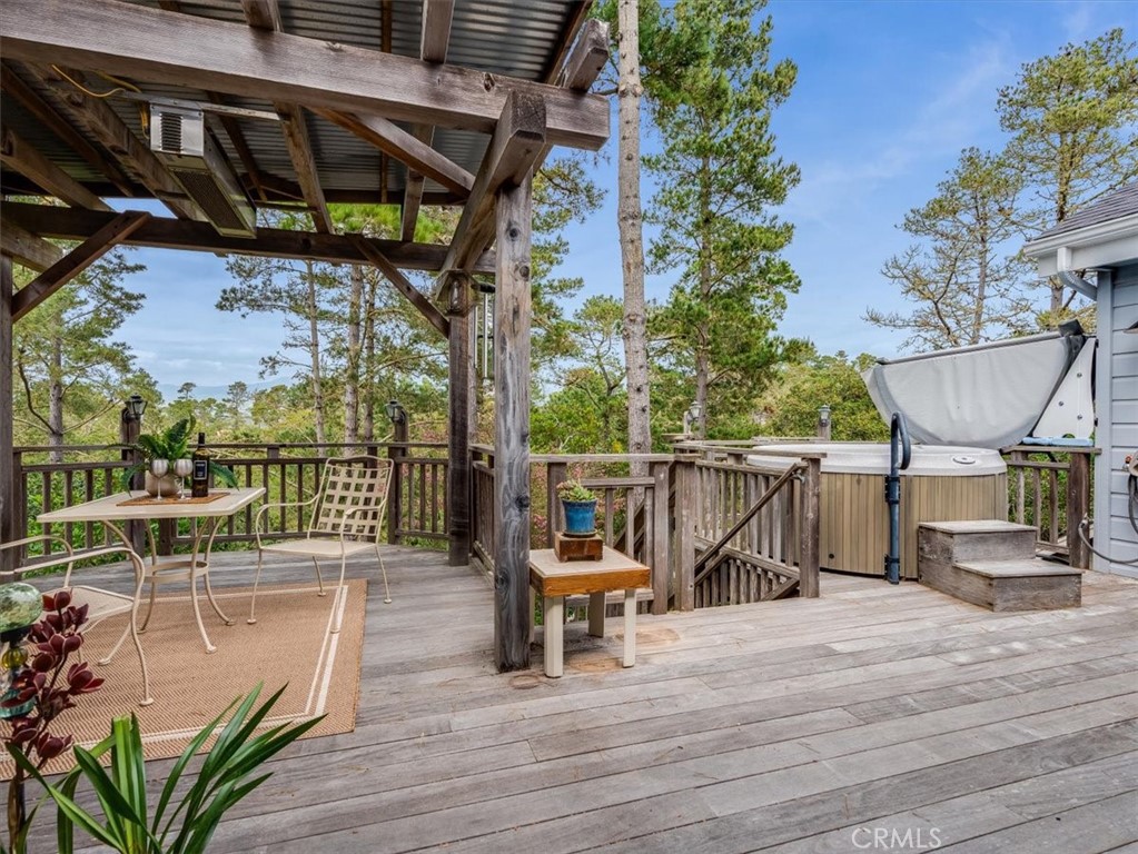 1810 Melrose Avenue Cambria, CA 93428 - Photo 32 of 74 a view of a chair and tables in the patio