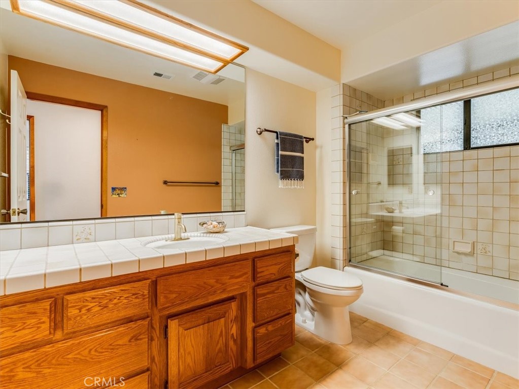 1810 Melrose Avenue Cambria, CA 93428 - Photo 44 of 74 a bathroom with a sink a toilet and shower